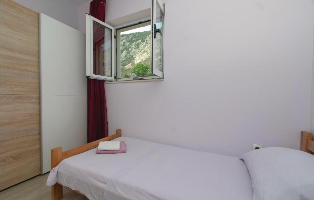 Posteľ alebo postele v izbe v ubytovaní Two-Bedroom Apartment In Trstenik