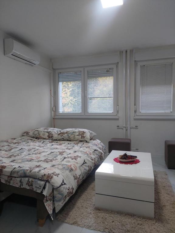 Postel nebo postele na pokoji v ubytování Apartman 078