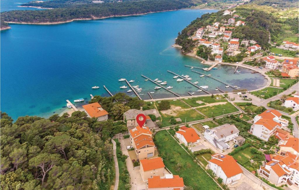 an aerial view of a harbor with boats in the water at 1 Bedroom Cozy Apartment In Palit in Palit