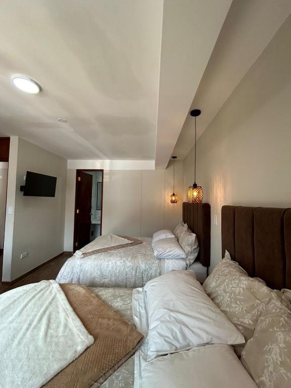 Katil atau katil-katil dalam bilik di JUAN PLACIDO Hospedaje