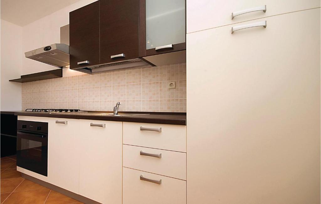 Kuchyňa alebo kuchynka v ubytovaní Apartment Stari Put Iv
