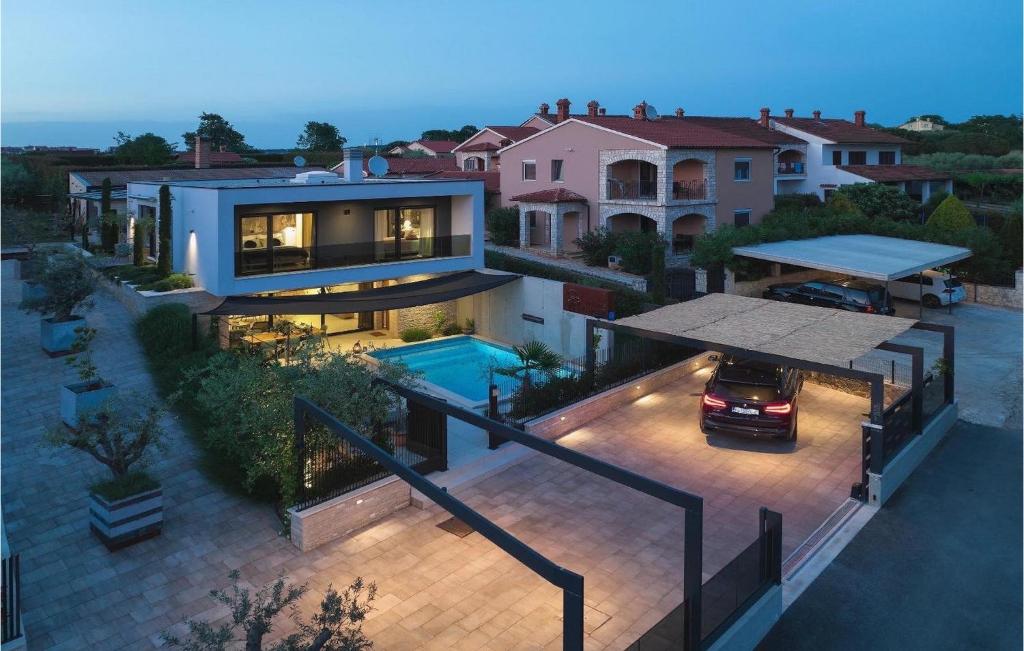 an aerial view of a house with a swimming pool at Villa Monte Grosso in Pula