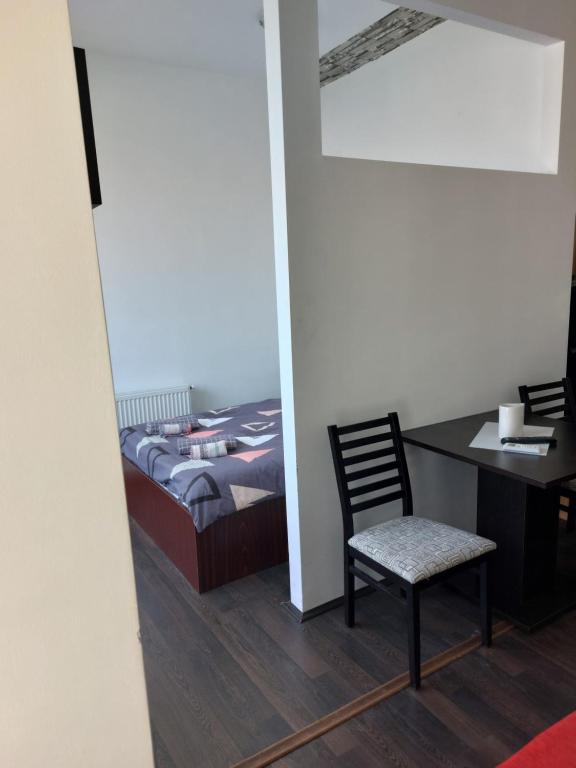 Postel nebo postele na pokoji v ubytování Apartmani Kuzman