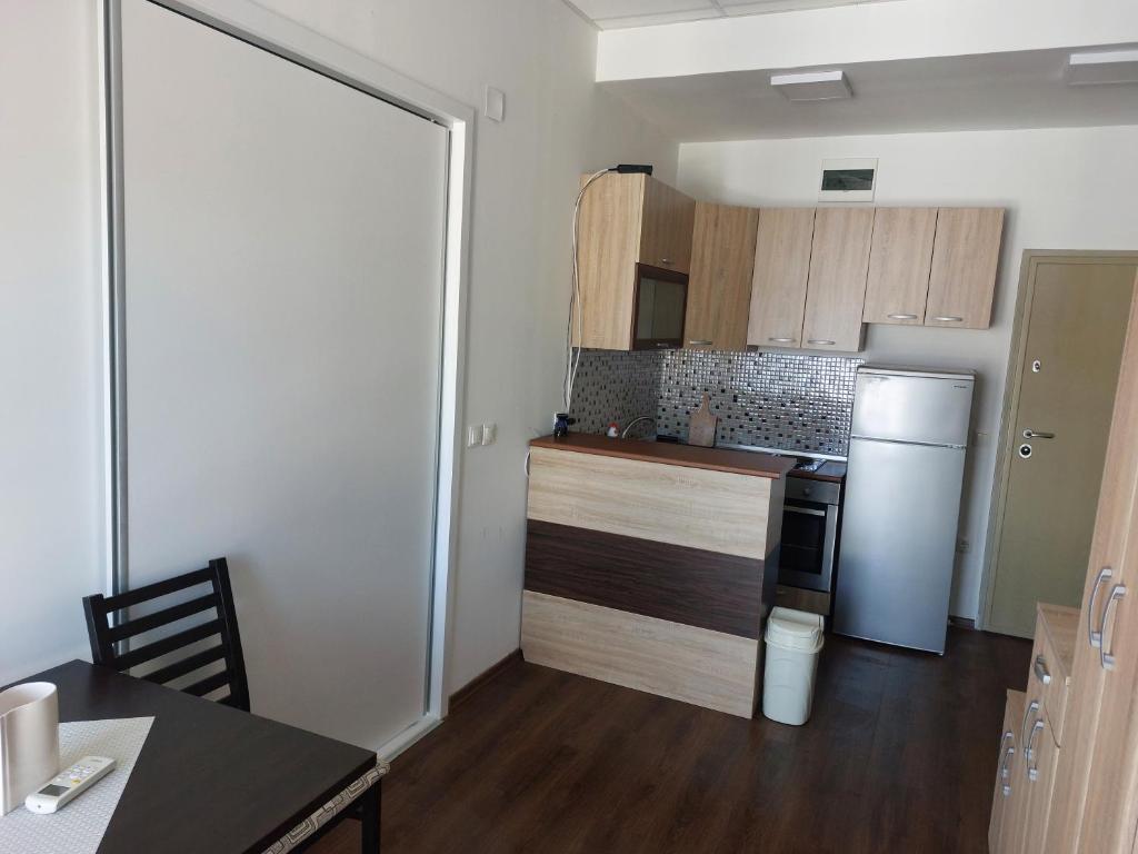 Kuchyň nebo kuchyňský kout v ubytování Apartmani Kuzman