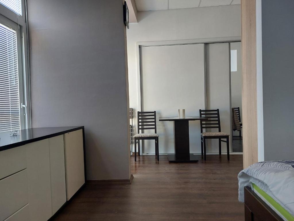 Postel nebo postele na pokoji v ubytování Apartmani Kuzman