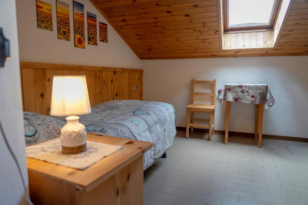 Postel nebo postele na pokoji v ubytování Camere vecchio borgo