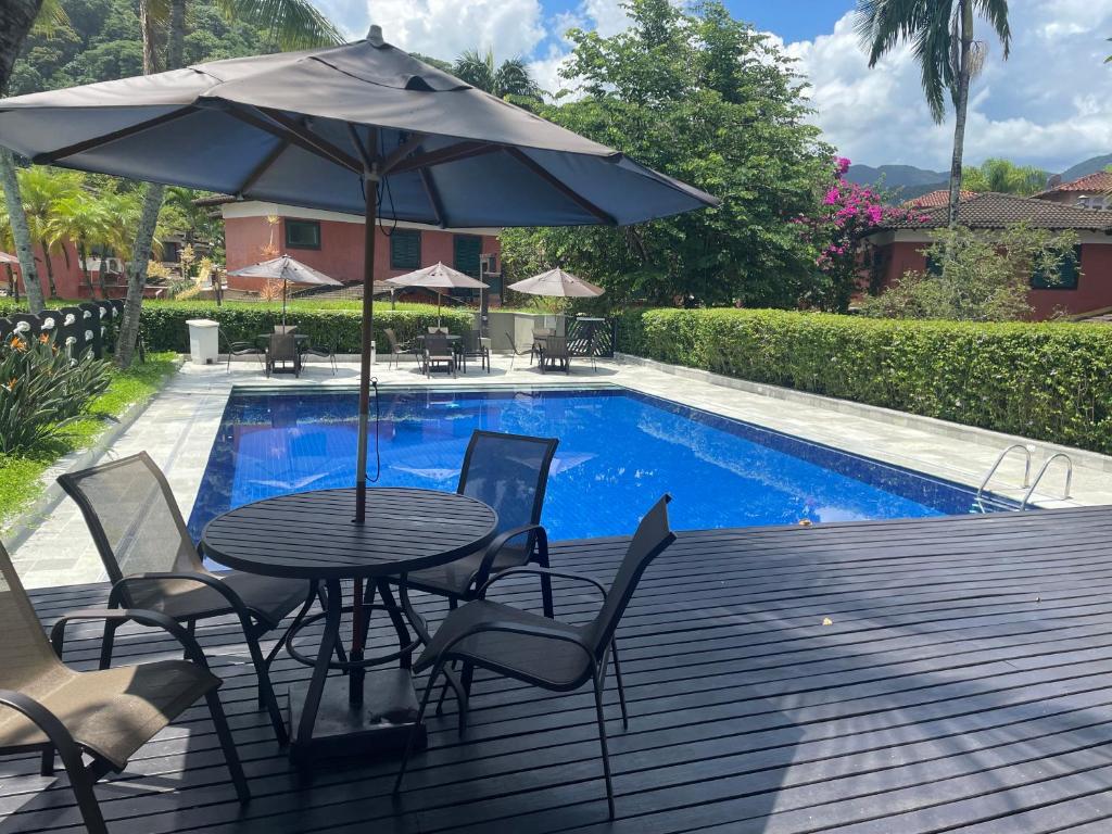 A piscina localizada em Condo-Resort Juquehy, 4 quartos ou nos arredores