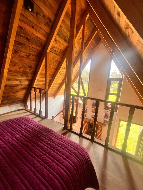 Postel nebo postele na pokoji v ubytování Cabañas Cumbres de Aguacatitla
