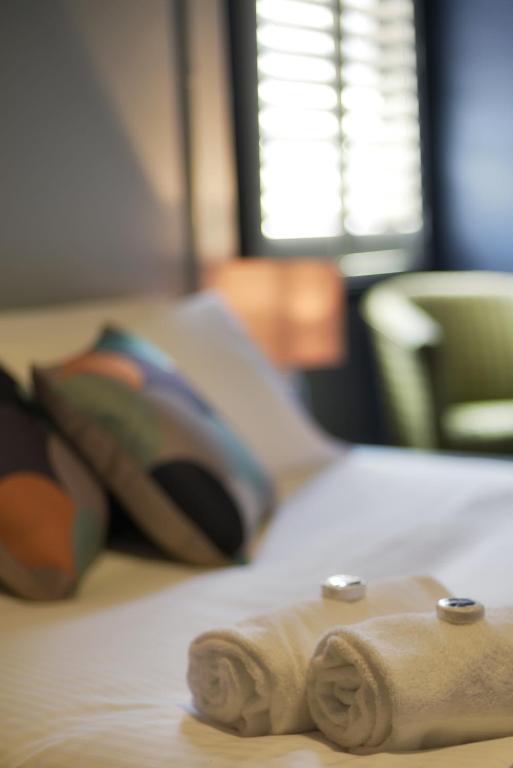 Postel nebo postele na pokoji v ubytování Hotel Canobolas