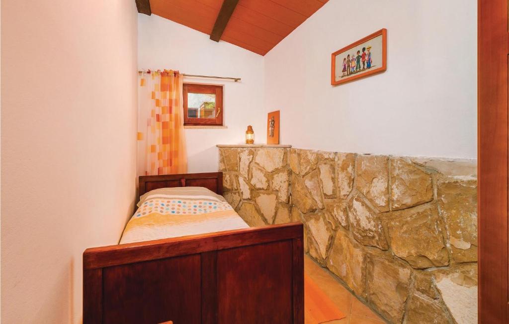 Postel nebo postele na pokoji v ubytování Holiday Home Reburici I