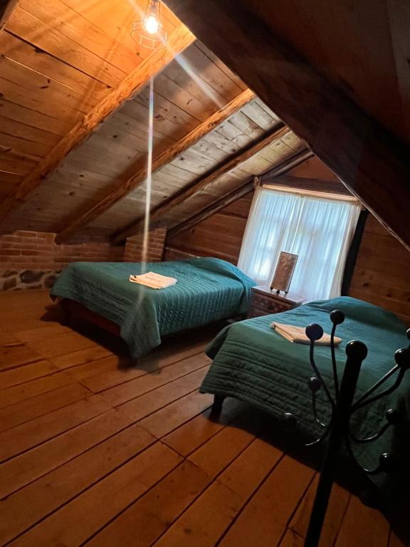 Postel nebo postele na pokoji v ubytování Cabañas Cumbres de Aguacatitla