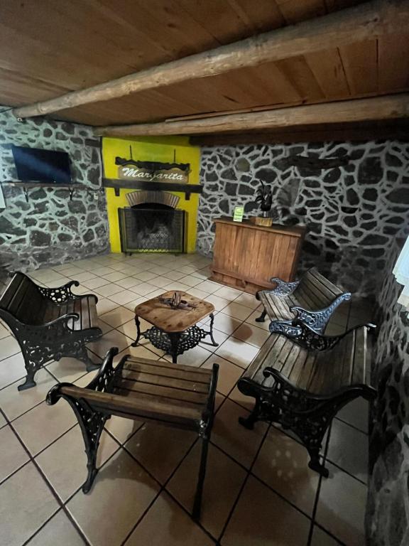 Posezení v ubytování Cabañas Cumbres de Aguacatitla