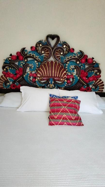 Postel nebo postele na pokoji v ubytování Hotel Chely