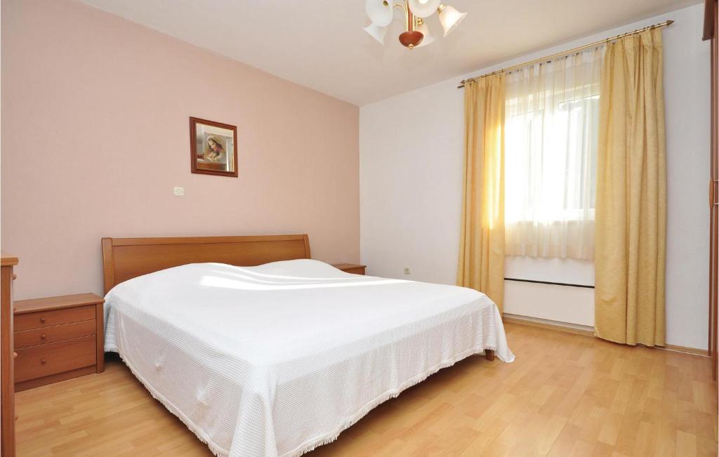 Postel nebo postele na pokoji v ubytování Apartment Pucisca 46