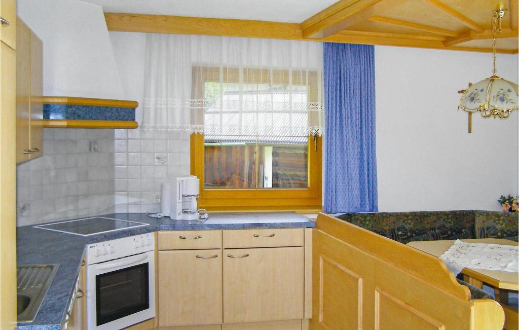 Kuchyňa alebo kuchynka v ubytovaní Ferienwohnung Kappl-Paznauntal