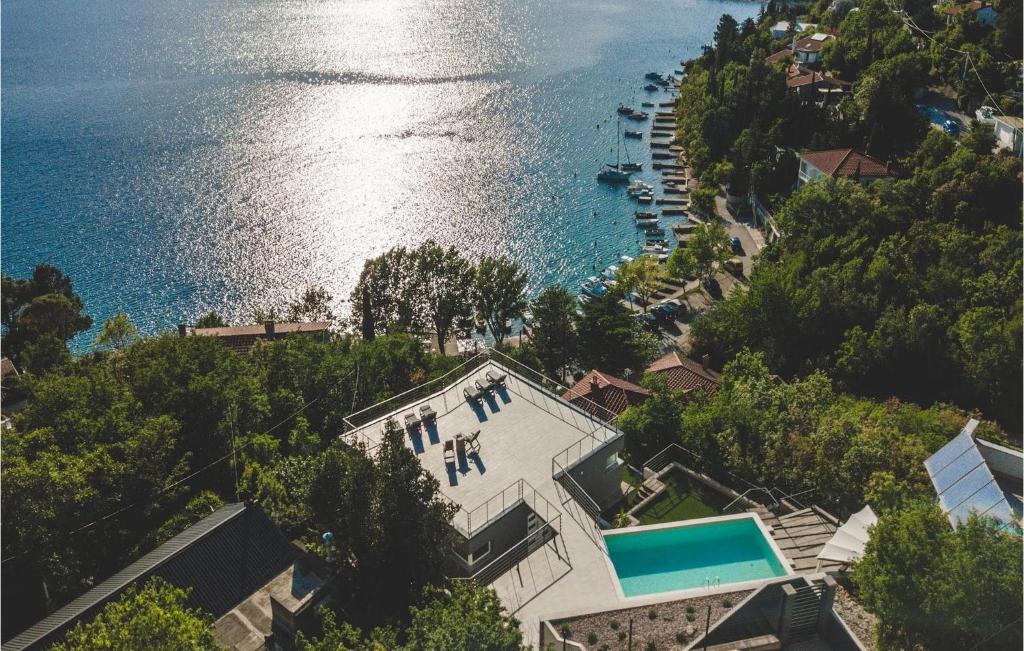 an aerial view of a house next to the water at Villa Grace in Jadranovo