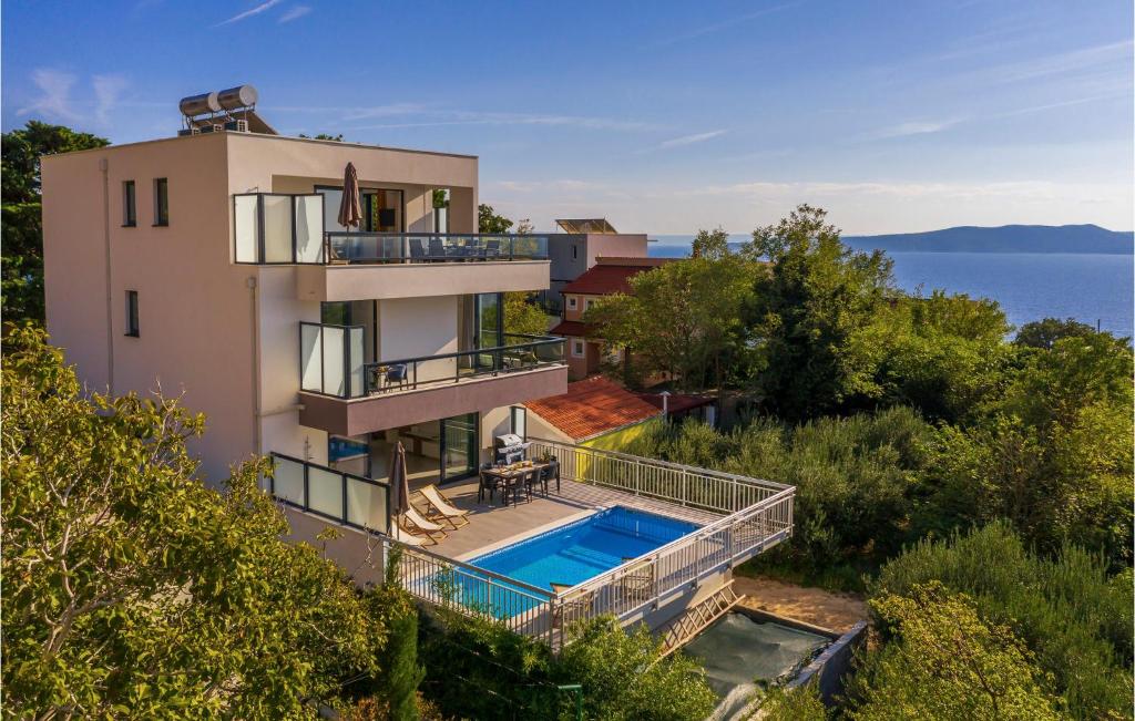 an aerial view of a house with a swimming pool at Gorgeous Home In Brela in Brela
