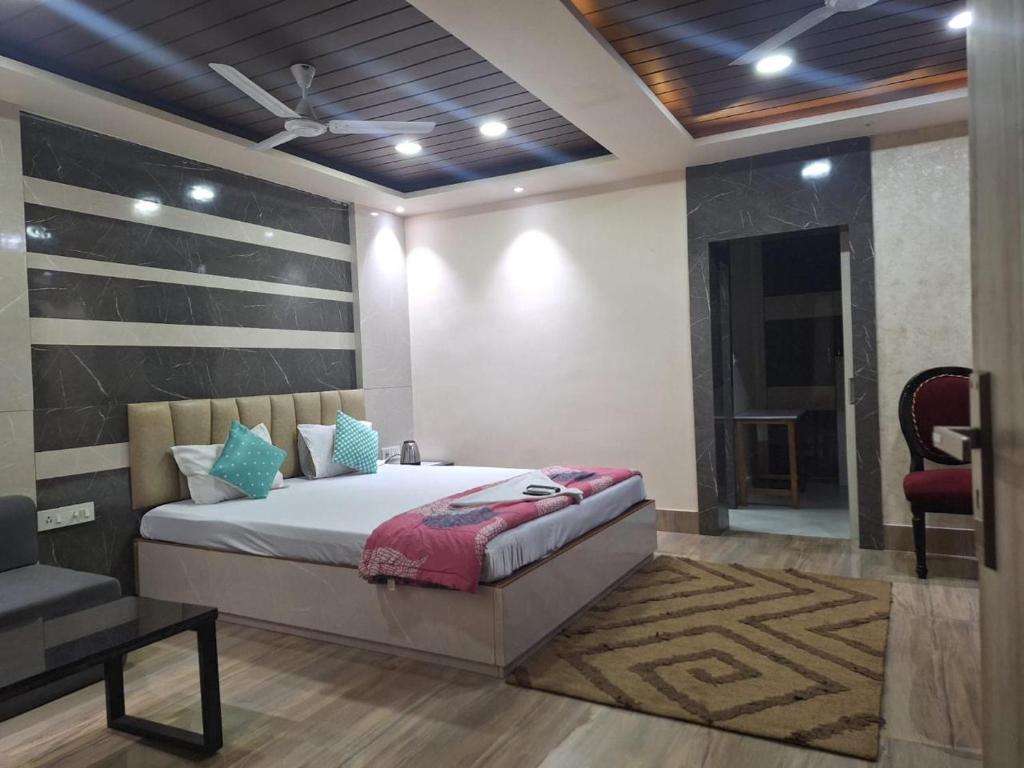 Postel nebo postele na pokoji v ubytování Mavenoak Dreams B&B