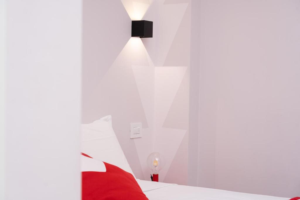Postel nebo postele na pokoji v ubytování House Of Design Casati