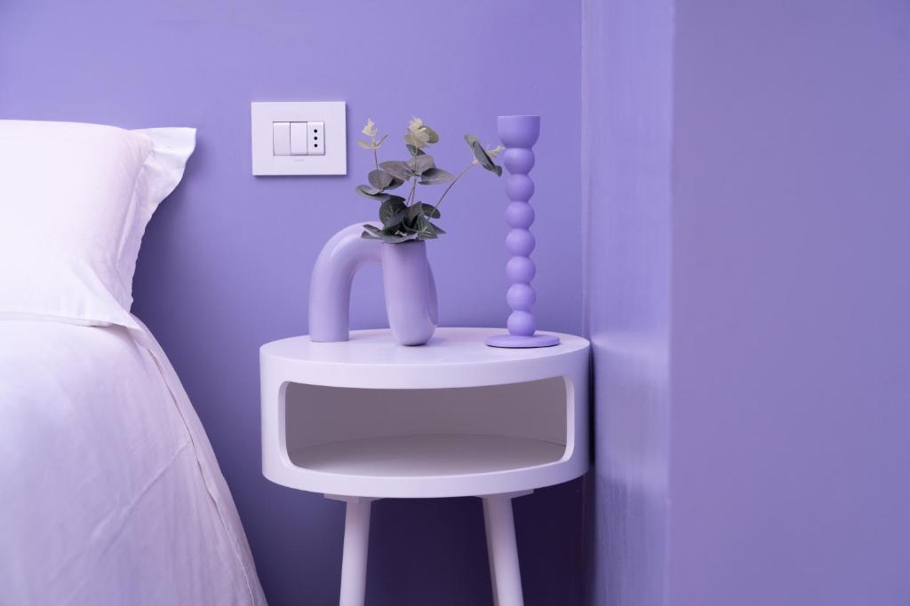 Postel nebo postele na pokoji v ubytování House Of Design Casati
