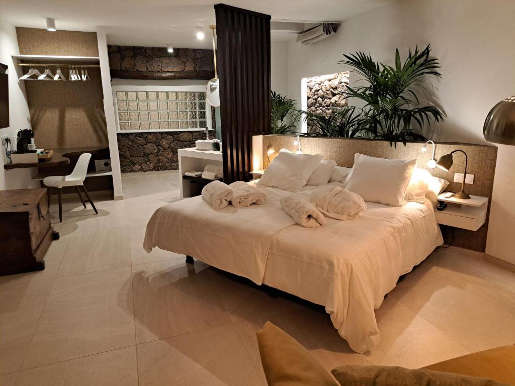 Postel nebo postele na pokoji v ubytování HC LUXURY CELAVELLa