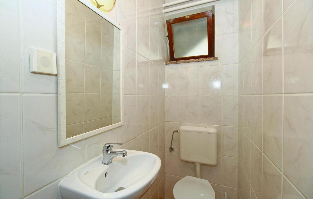 Kúpeľňa v ubytovaní Apartment V,c,emina Vi