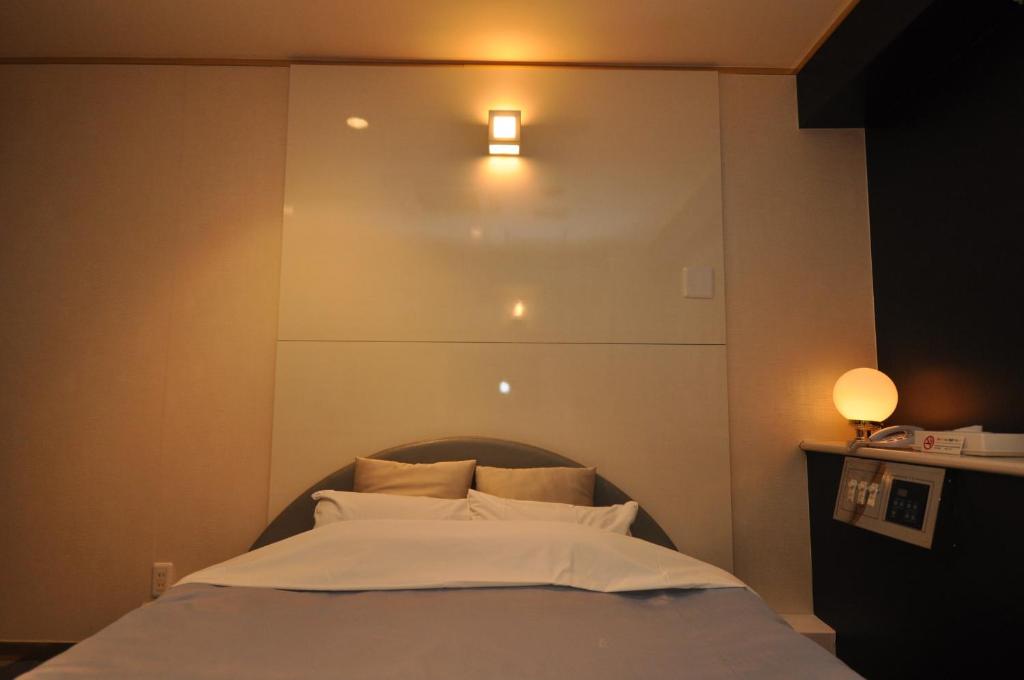 Postel nebo postele na pokoji v ubytování Hotel Boston Club (Adult Only)