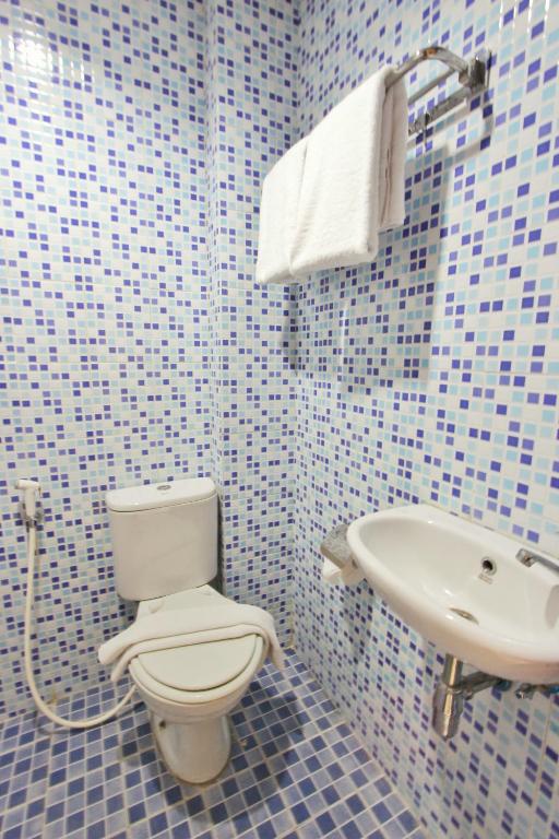 Koupelna v ubytování Rivisha Hotel