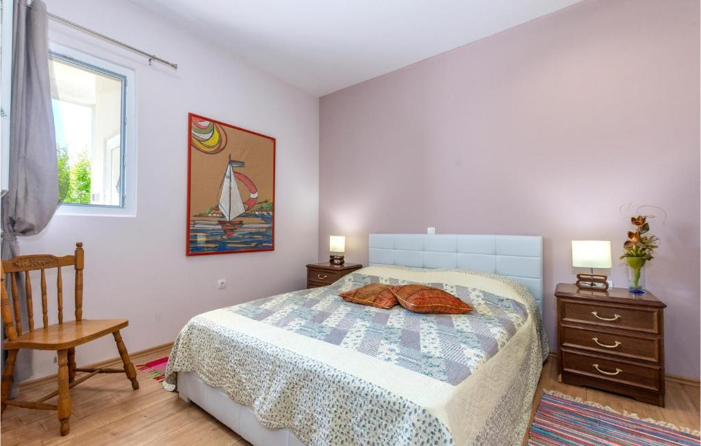 Postel nebo postele na pokoji v ubytování Holiday Home Gata Bb Iv