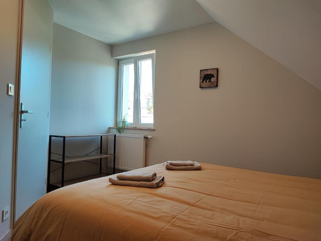 Postel nebo postele na pokoji v ubytování Le spitzacker gîte familial au calme