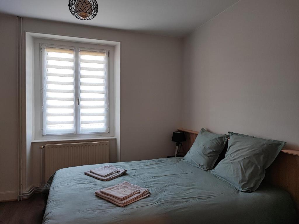 Postel nebo postele na pokoji v ubytování Le spitzacker gîte familial au calme