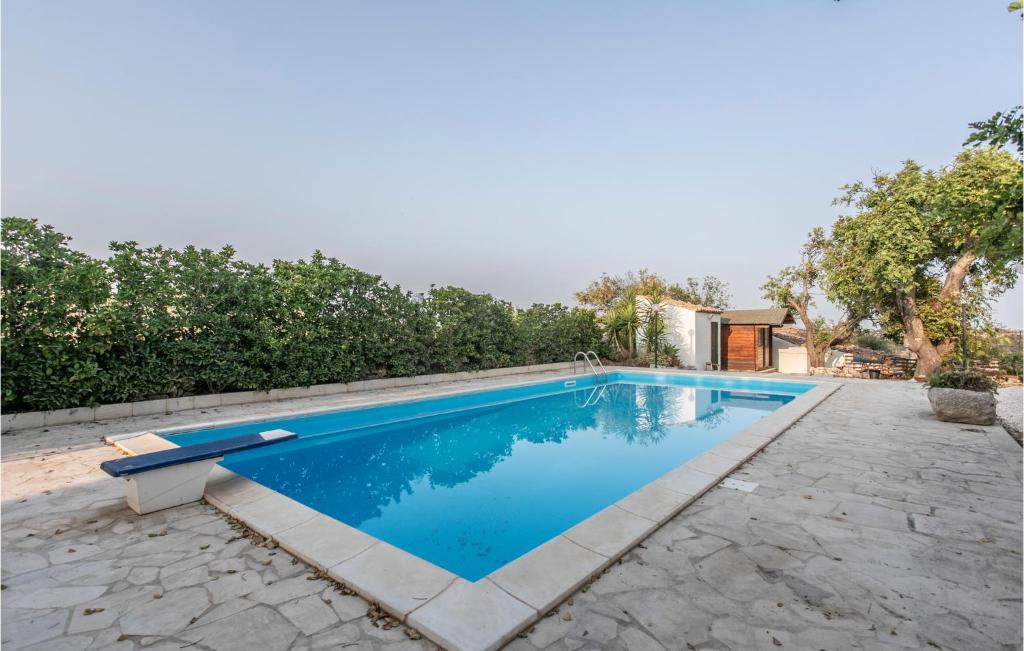 The swimming pool at or close to Nice Home In Modica With Wifi