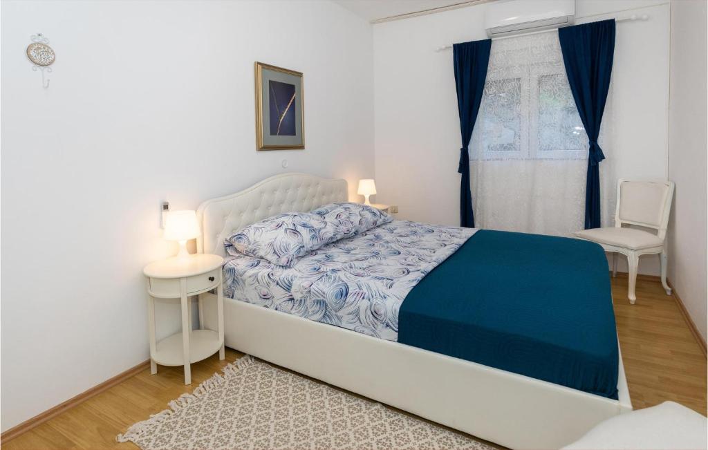 Posteľ alebo postele v izbe v ubytovaní Apartment Komarna Cr