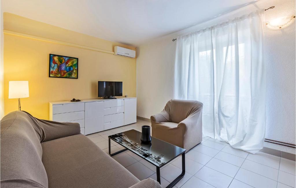 Telewizja i/lub zestaw kina domowego w obiekcie Holiday Home Cere Cere Ii