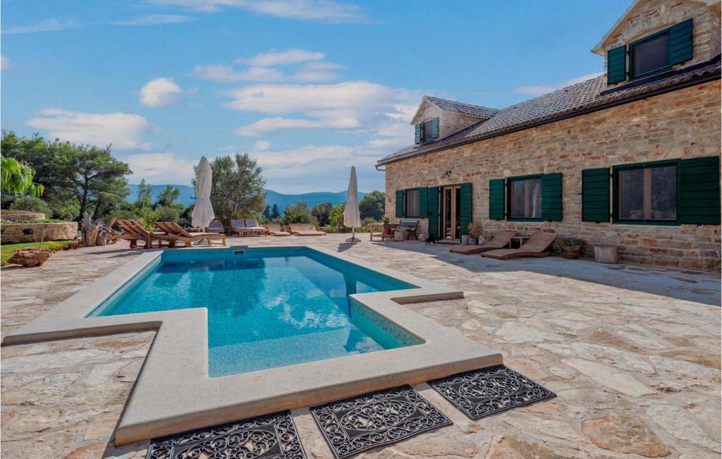 Πισίνα στο ή κοντά στο Villa Harpocrates