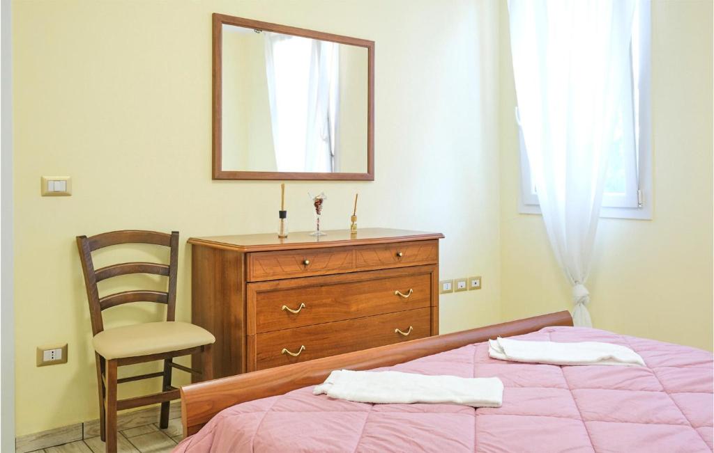 Łóżko lub łóżka w pokoju w obiekcie Casa Marina