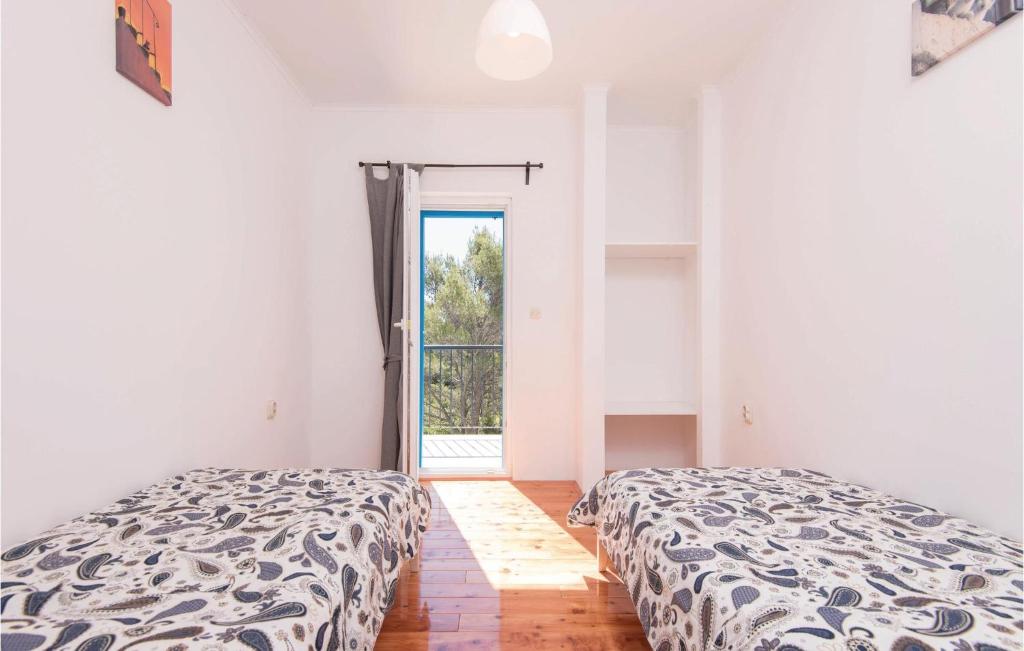 Fotografie z fotogalerie ubytování Three-Bedroom Holiday Home In Zrnovo v destinaci Korčula
