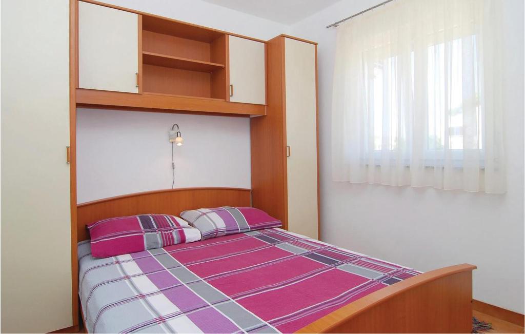 Posteľ alebo postele v izbe v ubytovaní Apartment Stari Put Iv