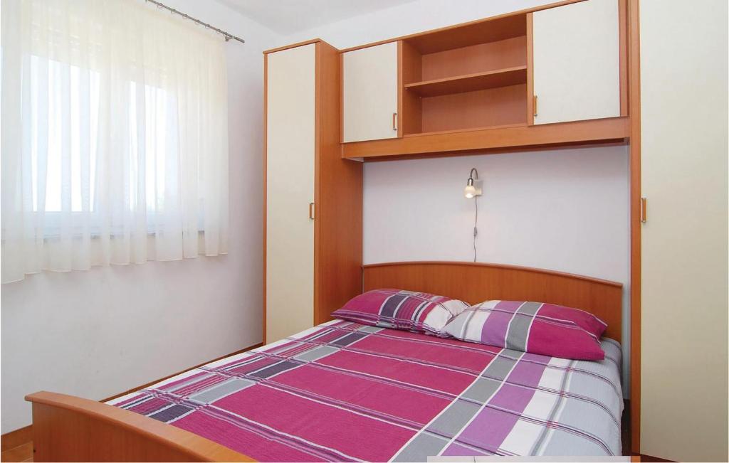 Posteľ alebo postele v izbe v ubytovaní Apartment Stari Put Iv