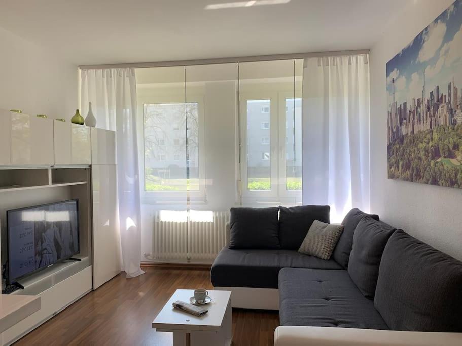 Χώρος καθιστικού στο Cozy Messe Apartment