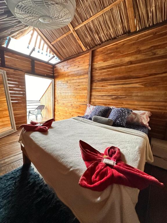 Postel nebo postele na pokoji v ubytování Casa MAGGY BARU BEACH