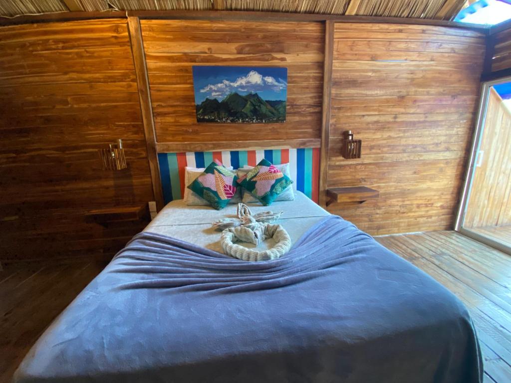Postel nebo postele na pokoji v ubytování Casa MAGGY BARU BEACH