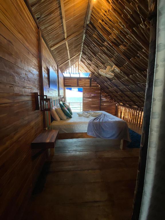 Postel nebo postele na pokoji v ubytování Casa MAGGY BARU BEACH