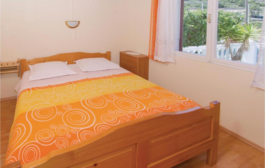 Posteľ alebo postele v izbe v ubytovaní Holiday Home Prapatna Bb I