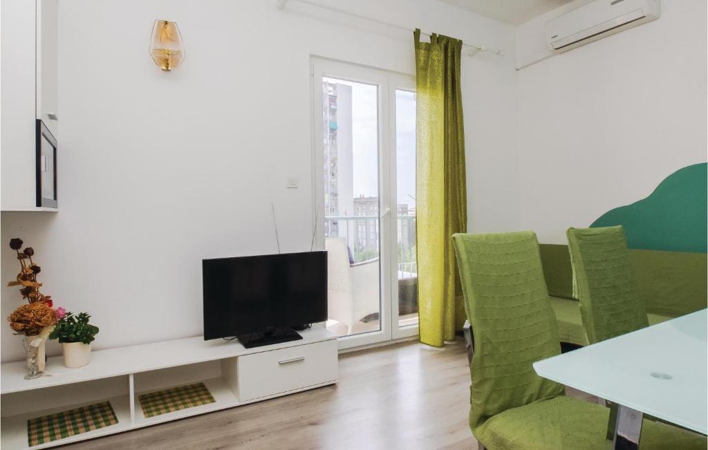 TV a/nebo společenská místnost v ubytování Apartment Split With Sea View Vii