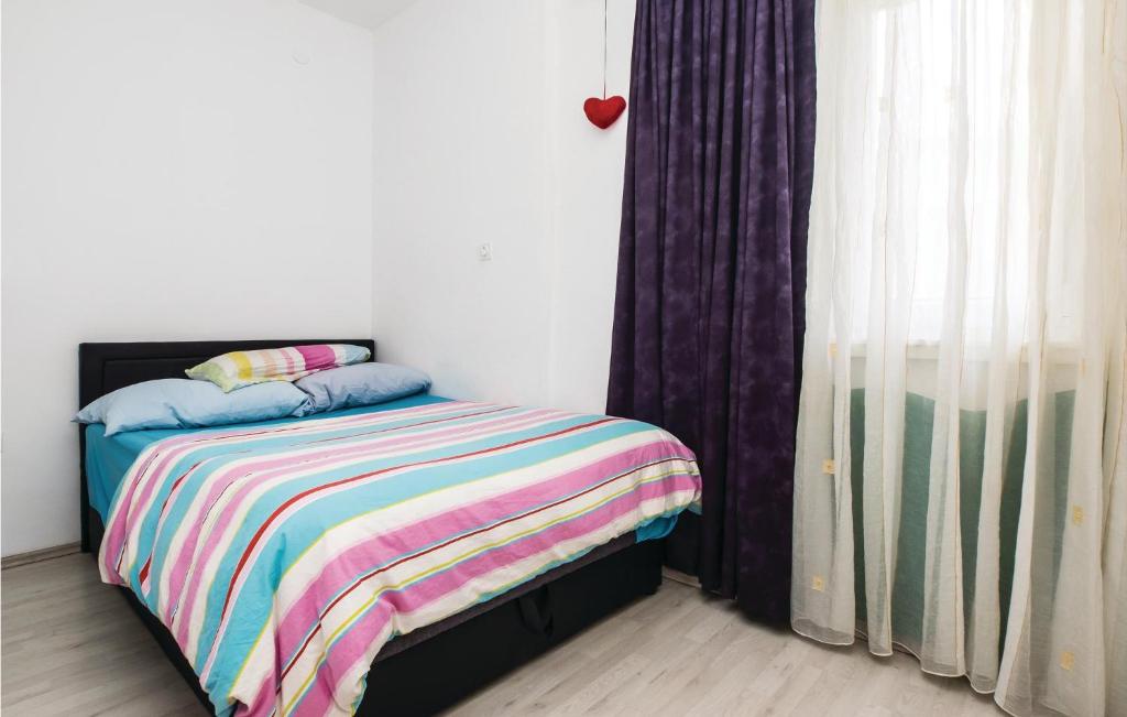 Postel nebo postele na pokoji v ubytování Apartment Split With Sea View Vii