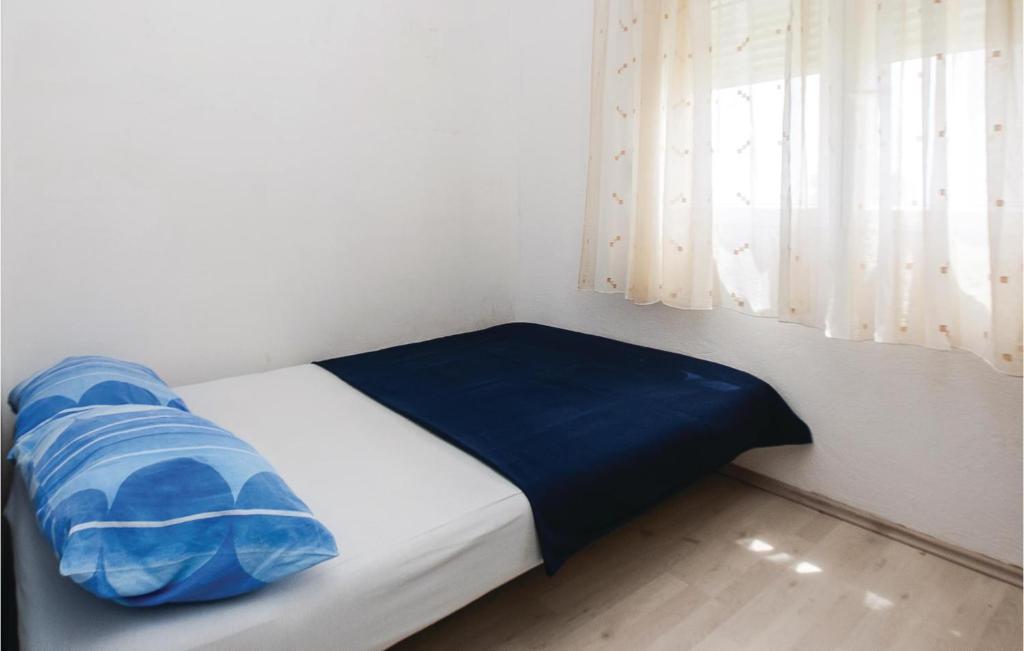 Postel nebo postele na pokoji v ubytování Apartment Split With Sea View Vii