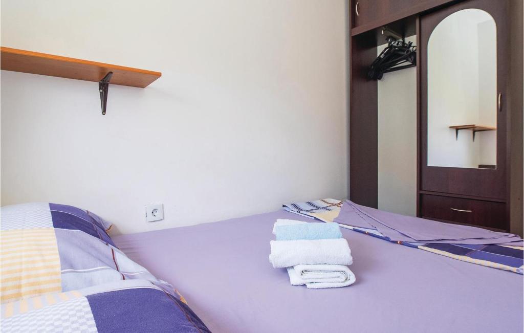Posteľ alebo postele v izbe v ubytovaní Apartment Split With Sea View Viii