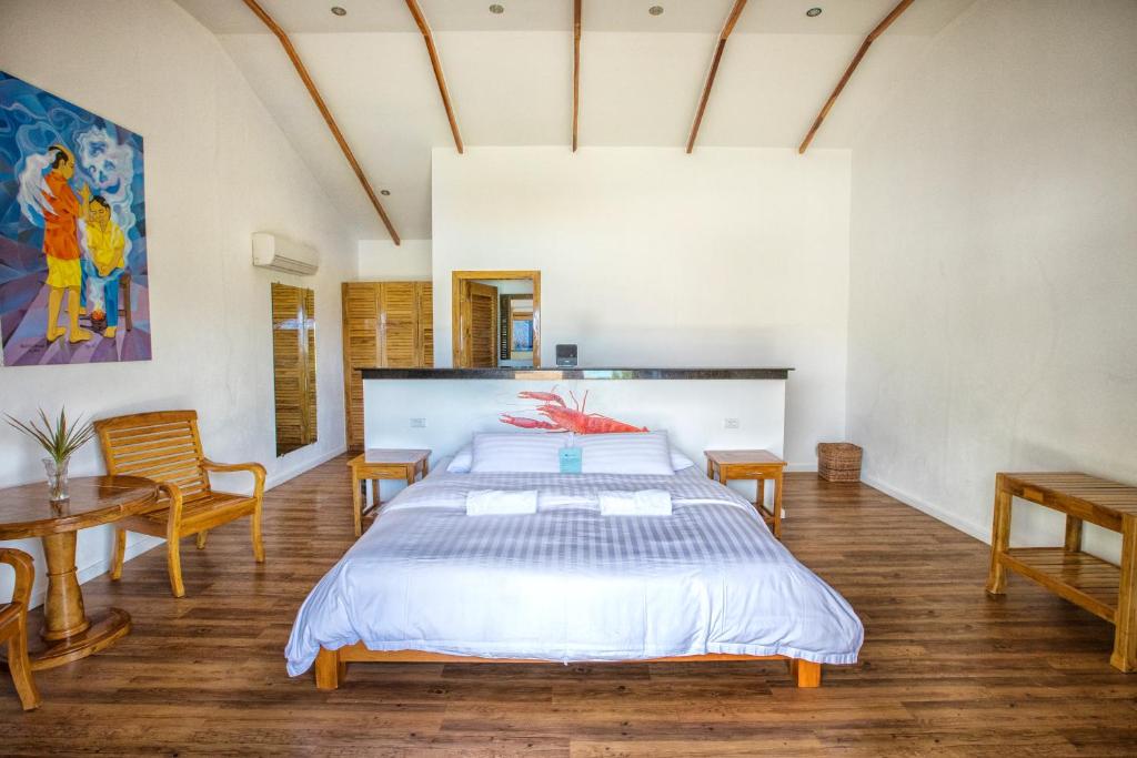 Postel nebo postele na pokoji v ubytování Salamangka Resort