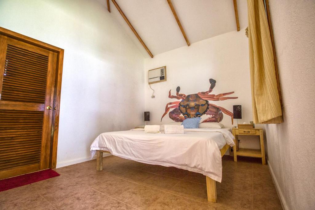 Postel nebo postele na pokoji v ubytování Salamangka Resort
